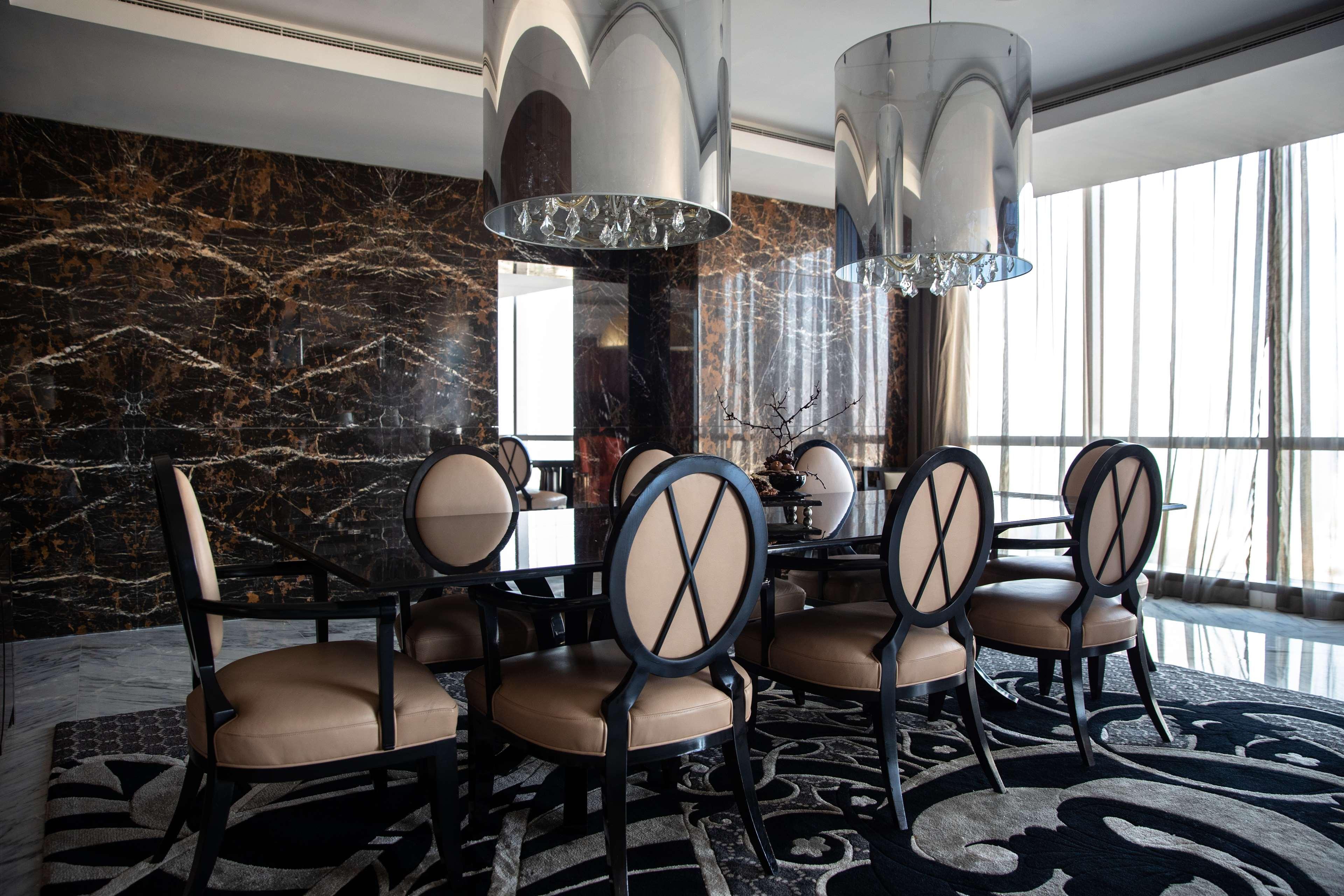 Hotel Conrad Abu Dhabi Etihad Towers Esterno foto A dining room in a luxury apartment