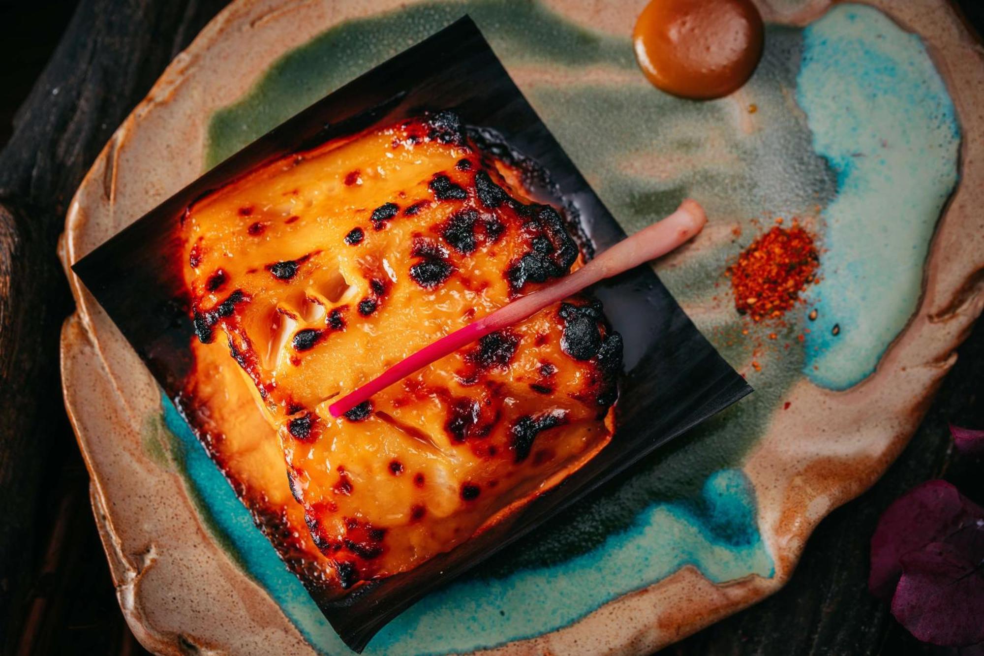 Hotel Conrad Abu Dhabi Etihad Towers Esterno foto A plate of grilled cheese